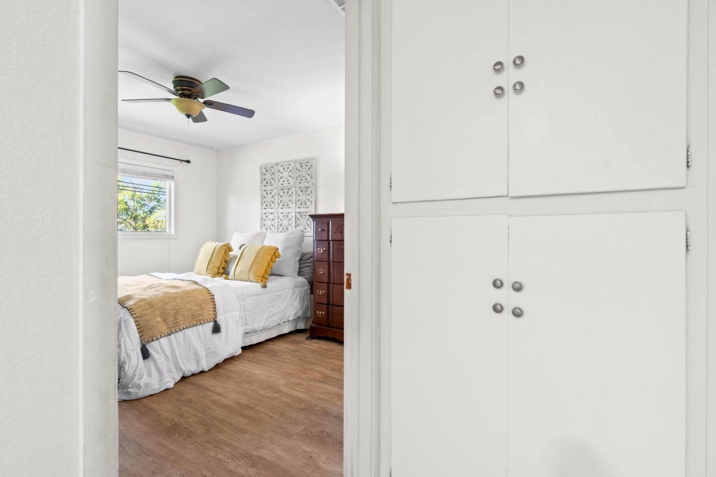 1706 Ayers Road Concord, CA 94521 - Photo 20 of 60 a bedroom with a bed and ceiling fan