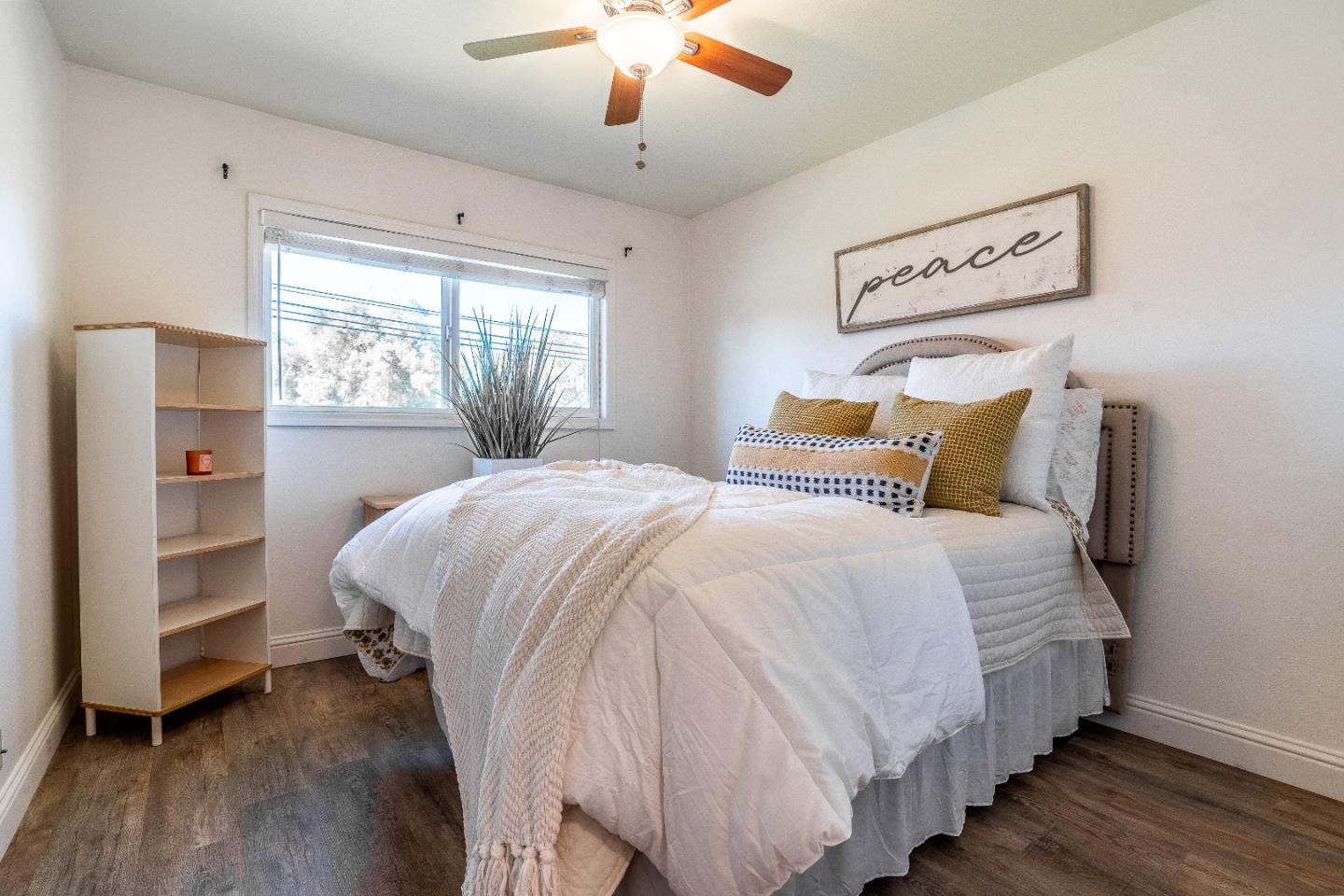 1706 Ayers Road Concord, CA 94521 - Photo 5 of 60 a bedroom with bed and wooden floor