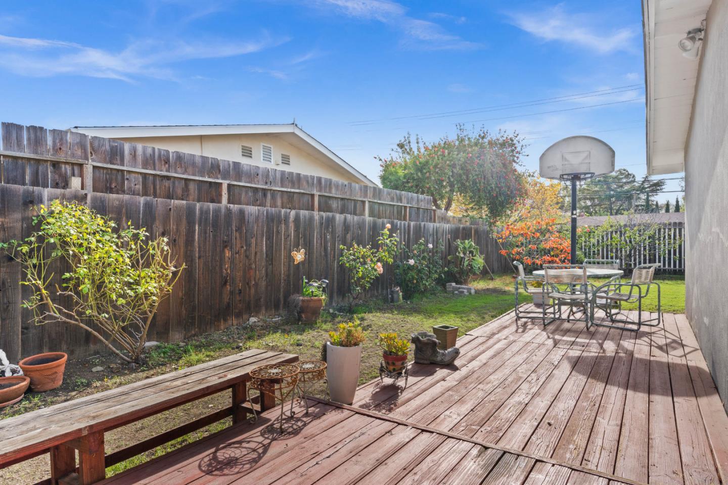 1706 Ayers Road Concord, CA 94521 - Photo 46 of 60 a view of a chairs and table on the wooden deck