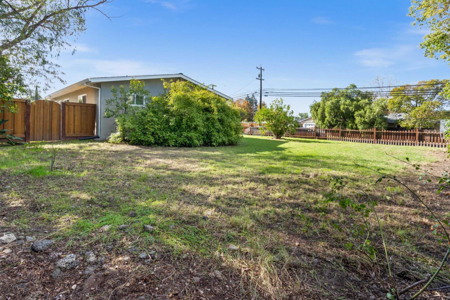 1706 Ayers Road Concord, CA 94521 - Photo 53 of 60 a view of a field with a tree in the background
