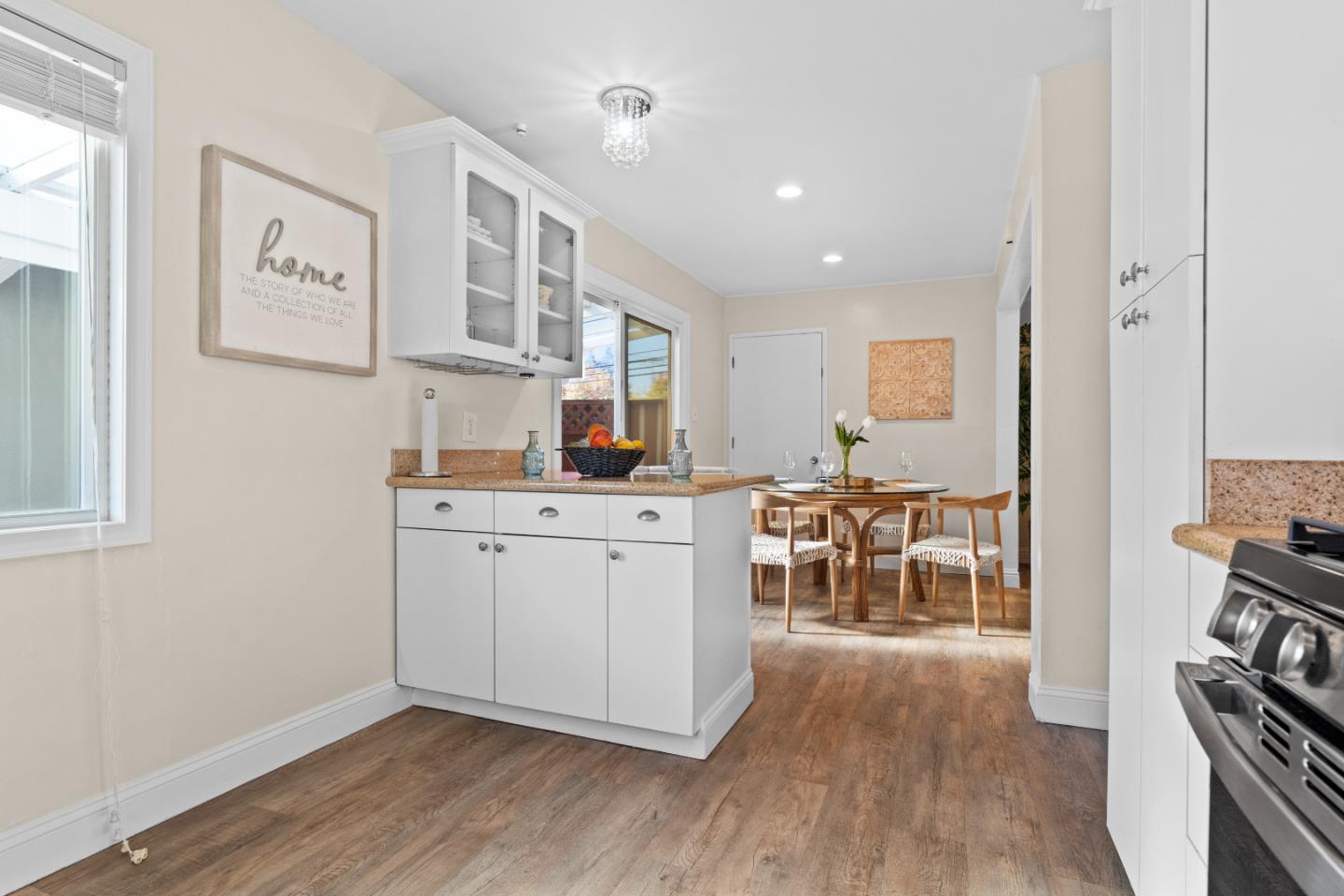 1706 Ayers Road Concord, CA 94521 - Photo 8 of 60 a kitchen with cabinets and wooden floor