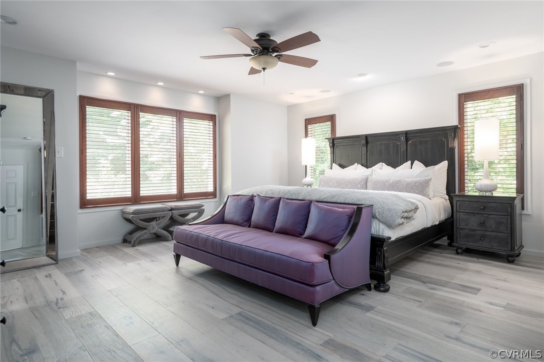 10645 Cherokee Road Richmond, VA 23235 - Photo 20 of 45 a bed room with a bed and a couch