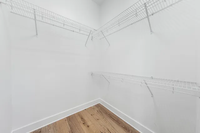 a view of a room with racks on the wall