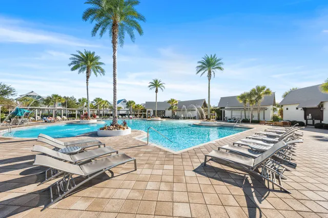 a view of a patio with furniture and a table and chairs