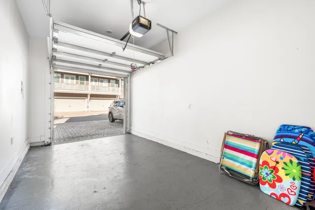 a room with toys and dresser with wooden floor