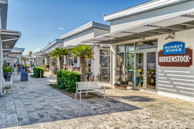 a view of a building with sitting area