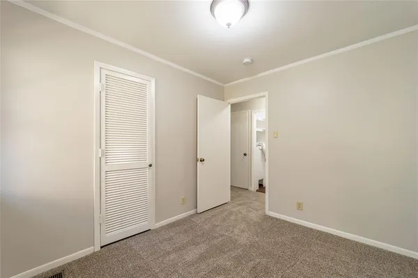 an empty room with closet