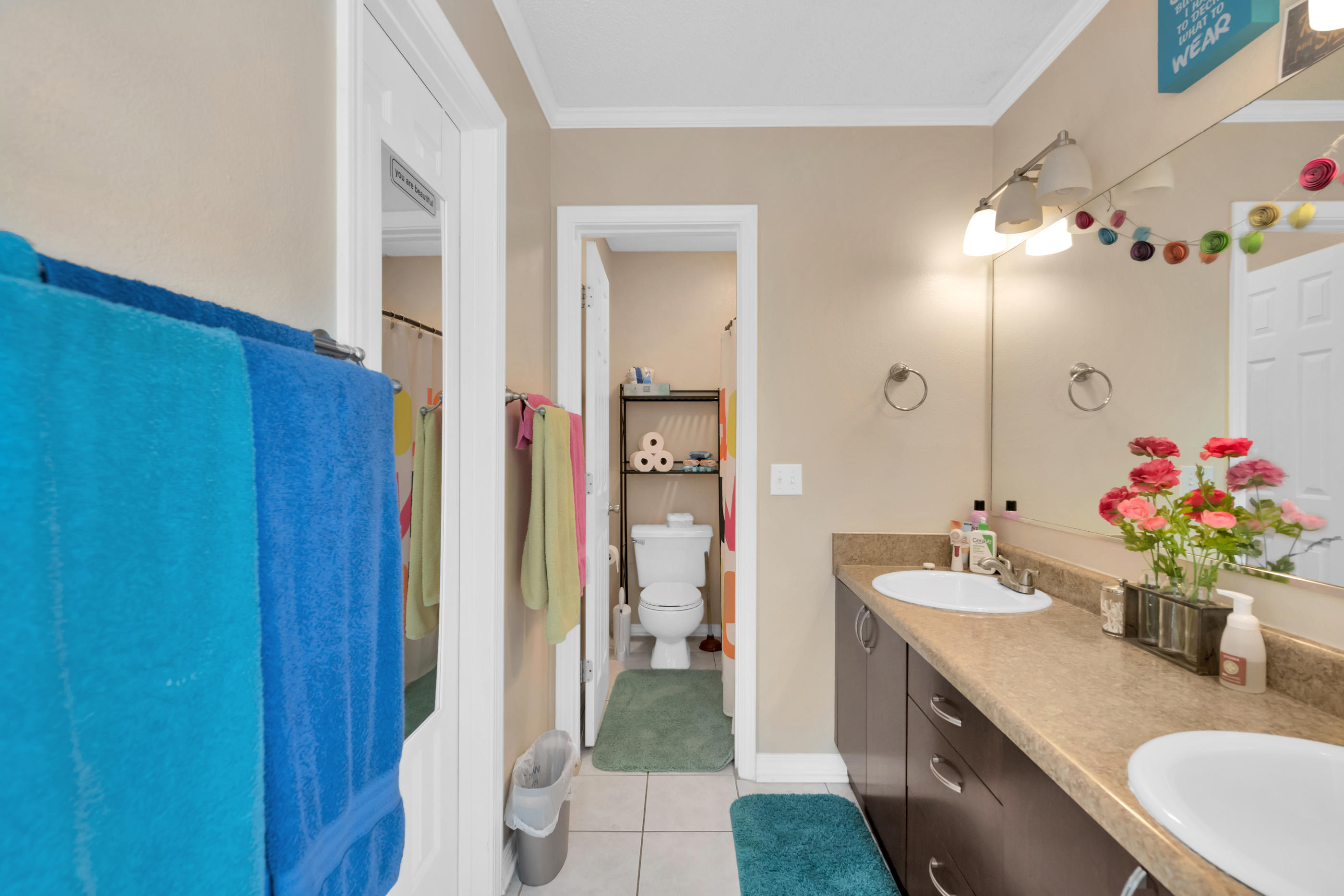 2734 Augustus Road Navarre, FL 32566 - Photo 6 of 23 a view of bathroom with dual sinks