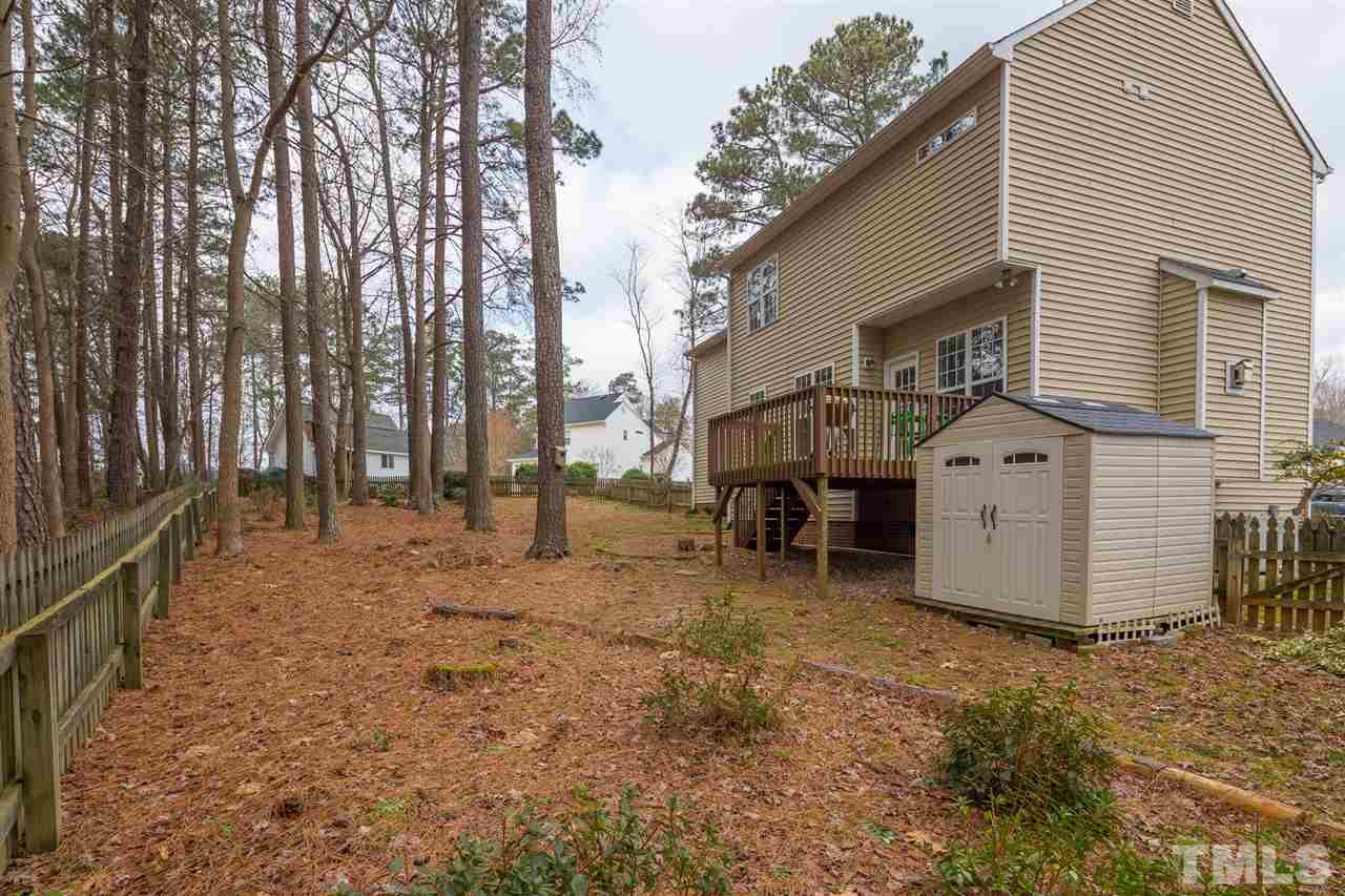 801 Shady Maple Court Raleigh, NC 27607 - Photo 22 of 22 a view of a house with a yard