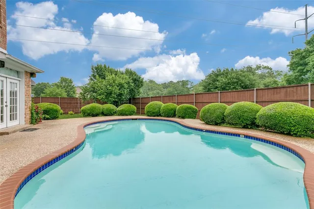 a view of a swimming pool and outdoor space