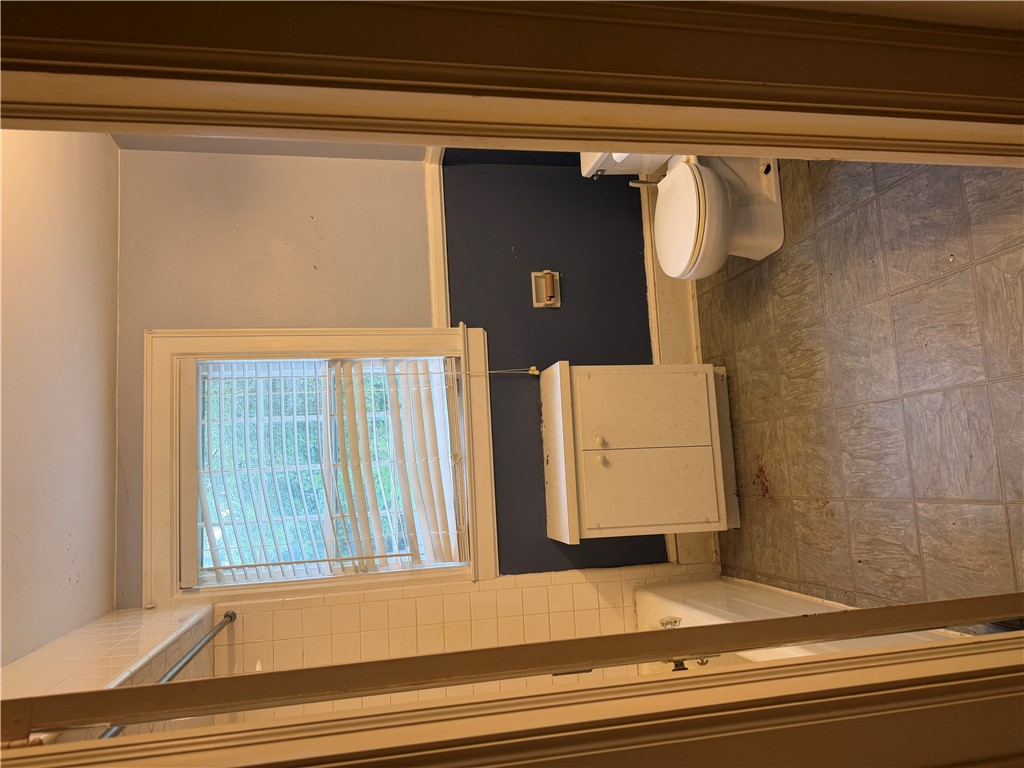 715 Concord Road Anderson, SC 29621 - Photo 20 of 24 A second bath is off the hall between bedroom 2 & 3.