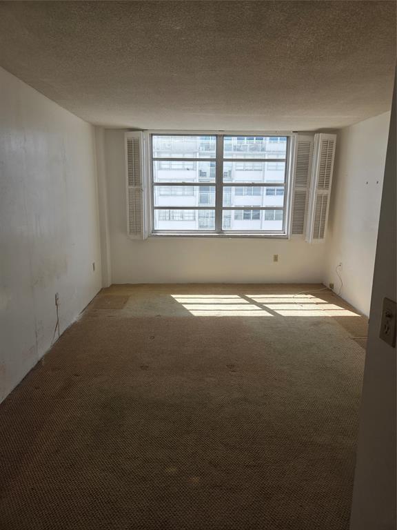 2750 Northeast 183rd Street, Unit 1803 Aventura, FL 33160 - Photo 11 of 14 a view of room with window