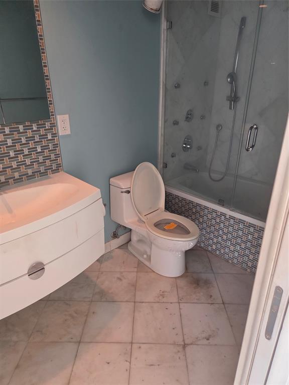 2750 Northeast 183rd Street, Unit 1803 Aventura, FL 33160 - Photo 12 of 14 a bathroom with a toilet and a shower