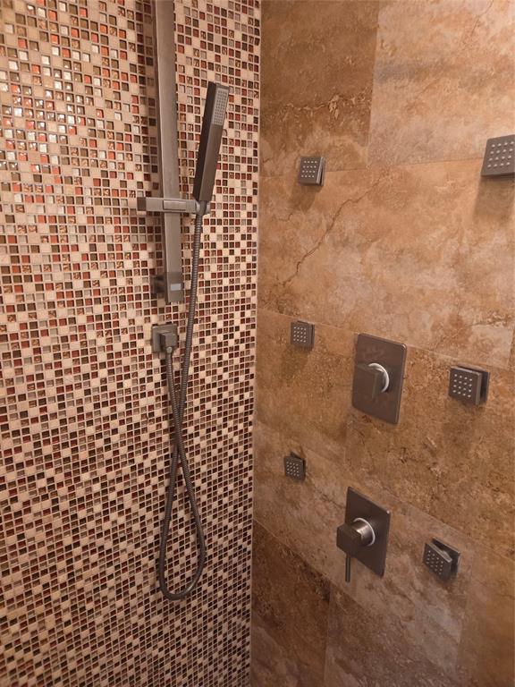 2750 Northeast 183rd Street, Unit 1803 Aventura, FL 33160 - Photo 9 of 14 a bathroom with a shower