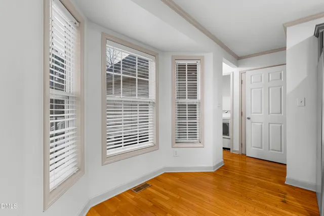 a view of a room with windows