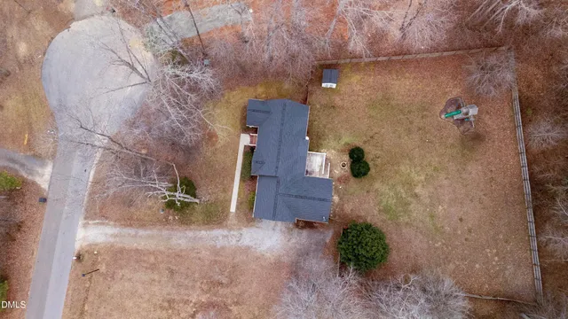 a bathroom with a shower and a mirror