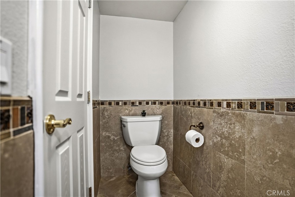 6568 Balzac Circle Riverside, CA 92506 - Photo 11 of 62 Downstairs primary en-suite bathroom is inside the primary bedroom. This was all built with permits.