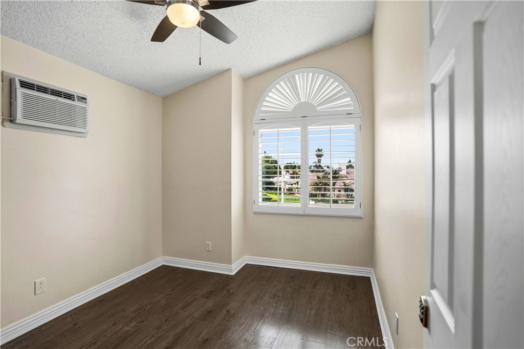 6568 Balzac Circle Riverside, CA 92506 - Photo 29 of 62 Upstairs bedrooms all have mini-splits for instant cold air as well as the central ac. Custom window designs with plantation shutters. Ceiling fans above.
