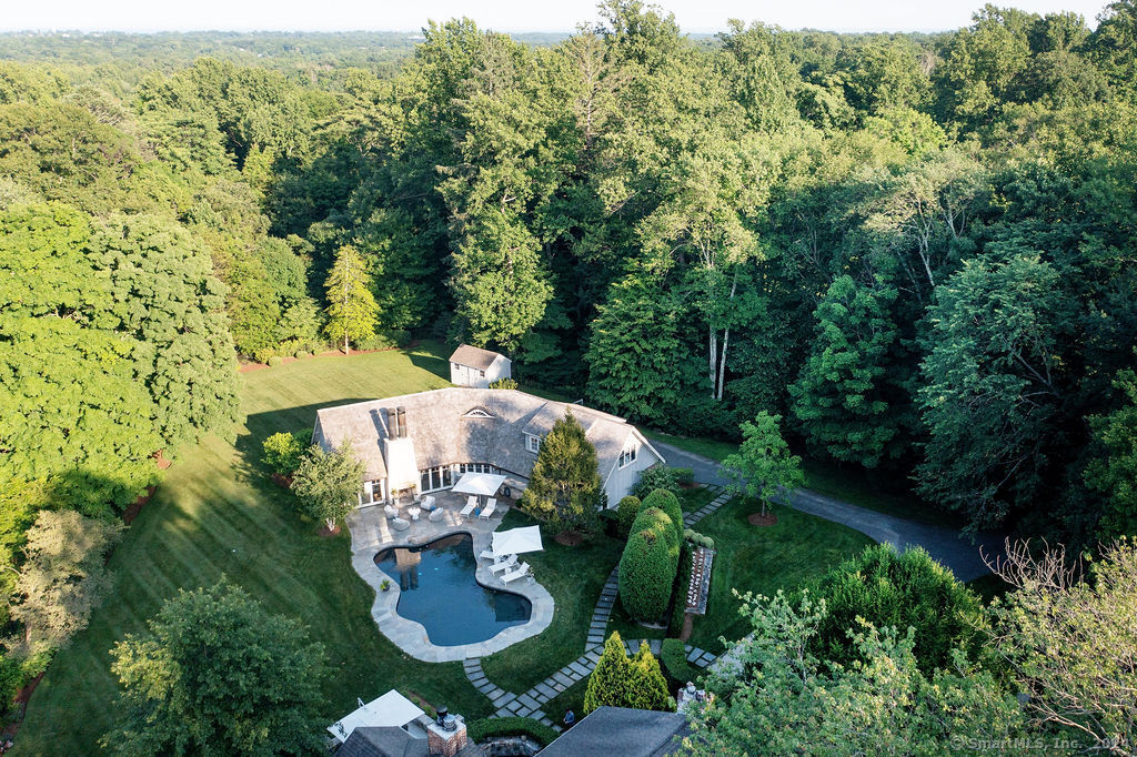 474 Brookside Road Norwalk, CT 06850 - Photo 2 of 40 an aerial view of green landscape with trees
