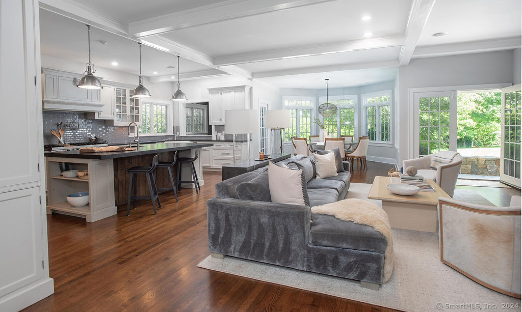 474 Brookside Road Norwalk, CT 06850 - Photo 10 of 40 a living room with furniture and a wooden floor