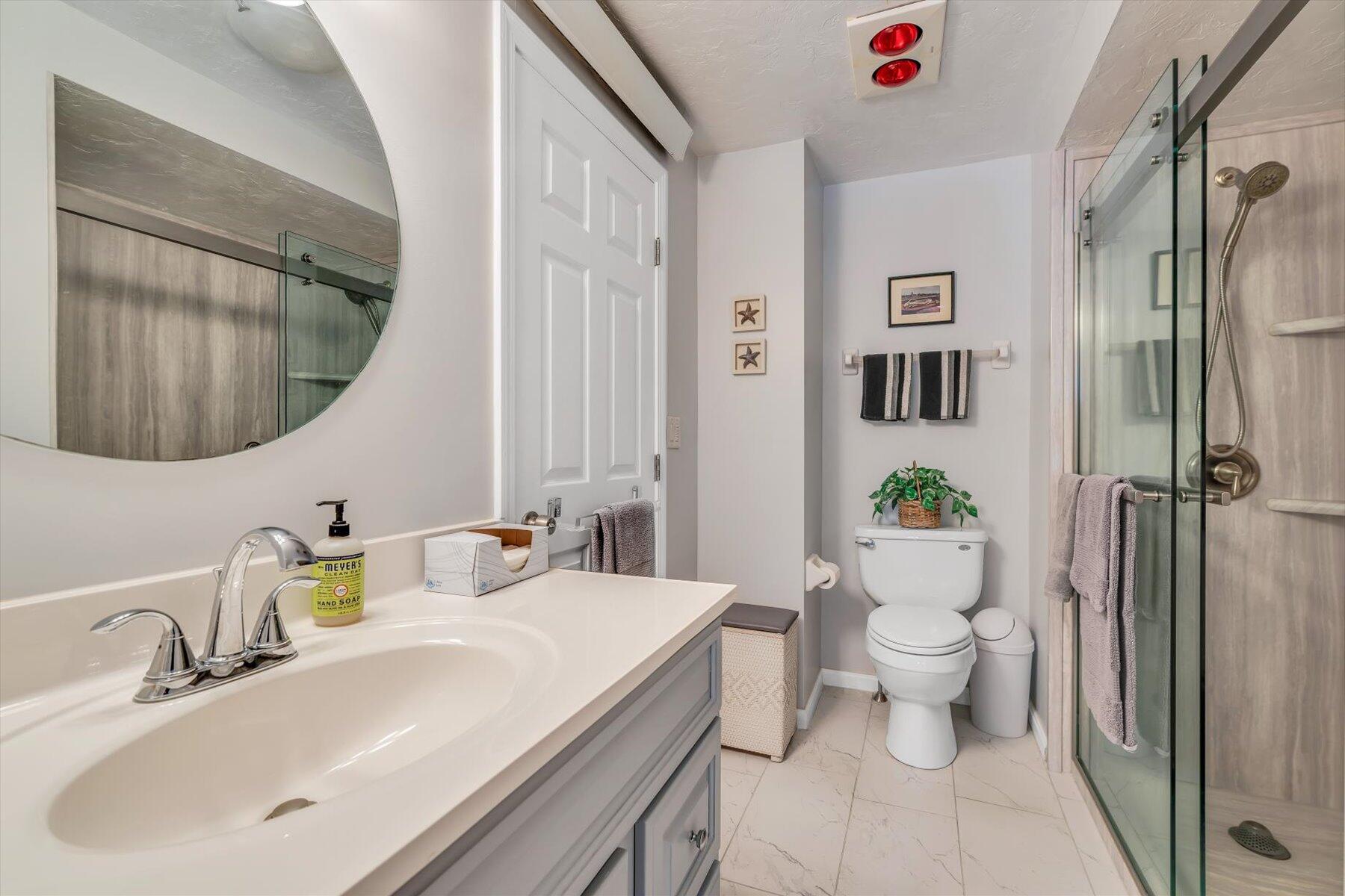 441 Buck Island Road, Unit B1 West Yarmouth, MA 02673 - Photo 21 of 31 a bathroom with a sink toilet and shower