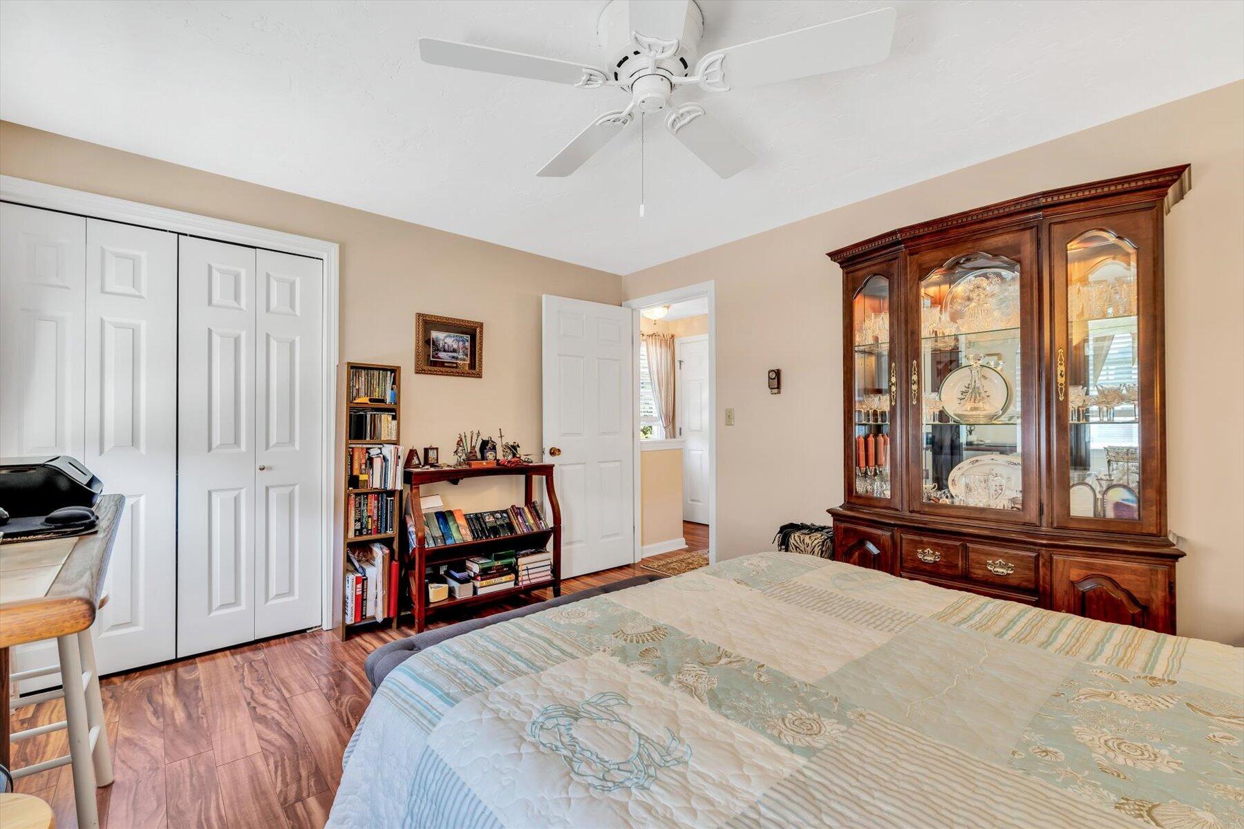 441 Buck Island Road, Unit B1 West Yarmouth, MA 02673 - Photo 24 of 31 a bedroom with a bed and a large window