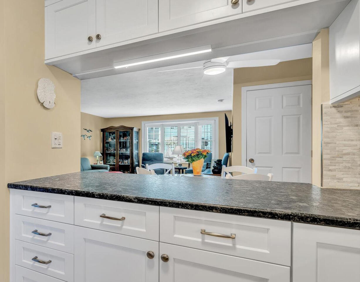 441 Buck Island Road, Unit B1 West Yarmouth, MA 02673 - Photo 6 of 31 a kitchen with sink and a window