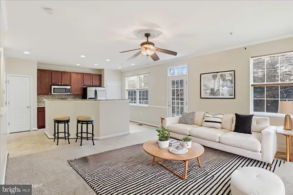 a view of a kitchen with furniture and a kitchen