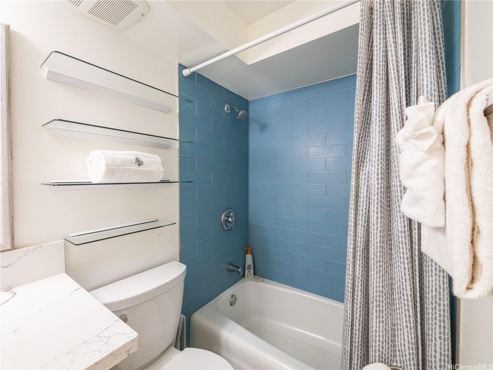 2572 Lemon Road, Unit 610 Honolulu, HI 96815 - Photo 16 of 24 a bathroom with a toilet and a bathtub