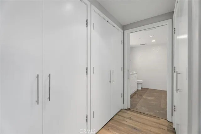 a view of a bathroom with a glass door and shower
