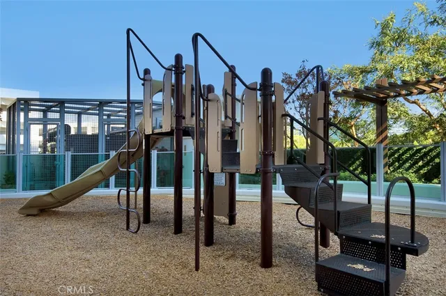 a view of a patio with table and chairs and potted plants