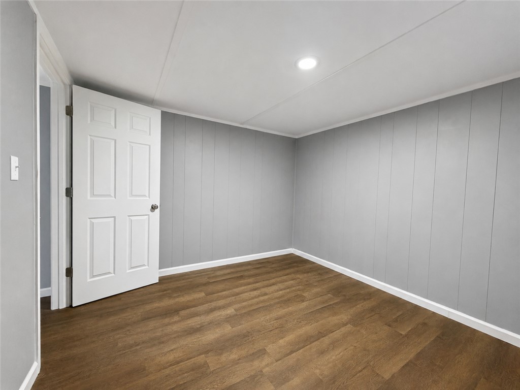 3301 Dixon Road Anderson, SC 29625 - Photo 13 of 20 Well-lit room with wood plank flooring provides a versatile canvas for living.