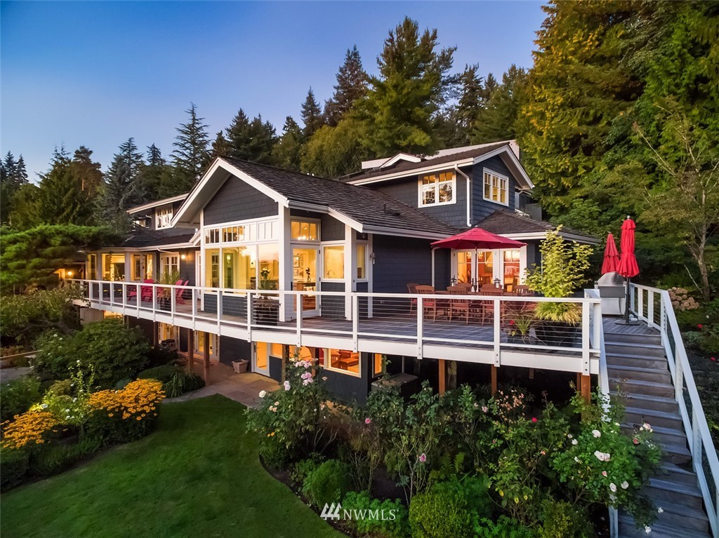 17 Brook Bay Road Mercer Island, WA 98040 - Photo 3 of 25 a front view of a house with a yard and potted plants