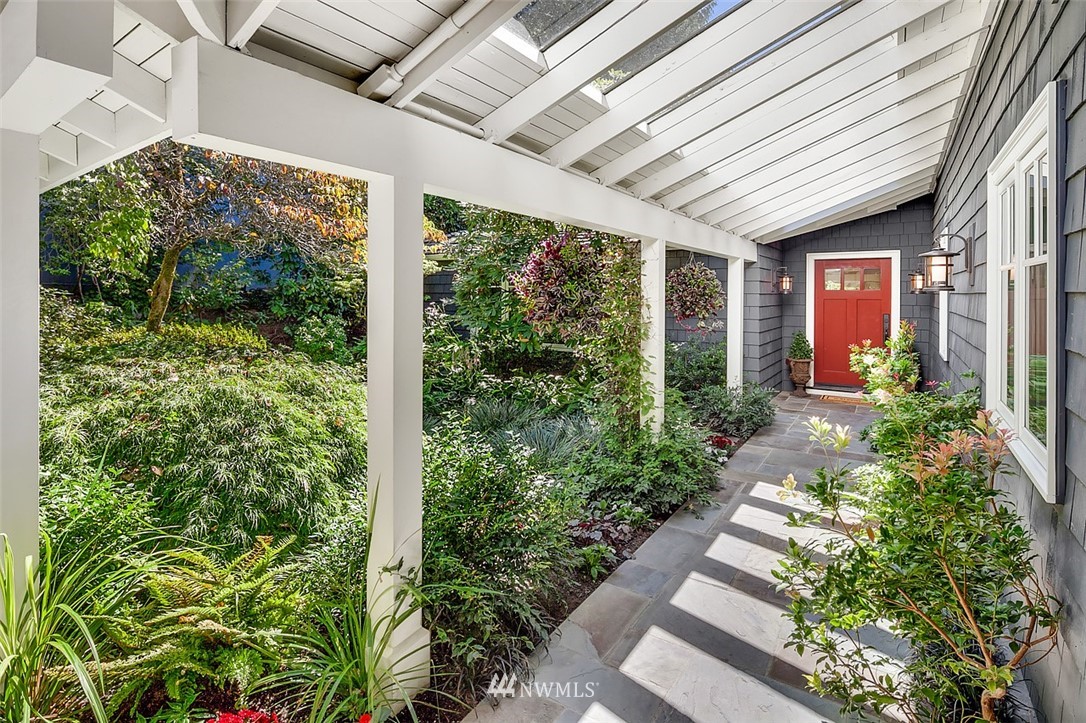 17 Brook Bay Road Mercer Island, WA 98040 - Photo 5 of 25 a view of a porch with a lot of flower plants
