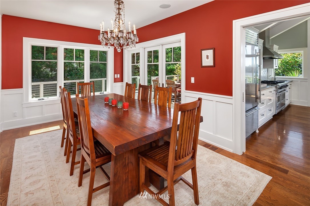 17 Brook Bay Road Mercer Island, WA 98040 - Photo 10 of 25 a view of a dining room with furniture window and wooden floor