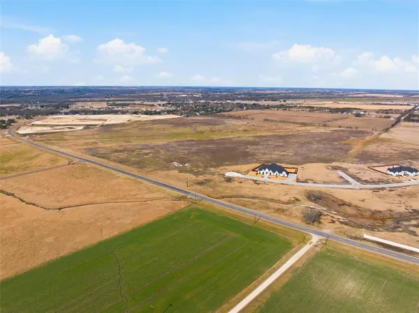 an aerial view of residential building with ocean view