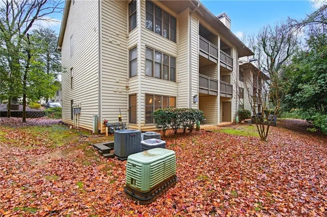 a view of a backyard with sitting area