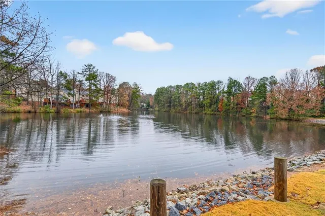 a view of a patio with chairs and table on the patio