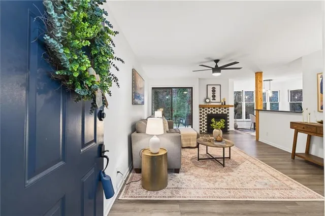 a living room with furniture and a table