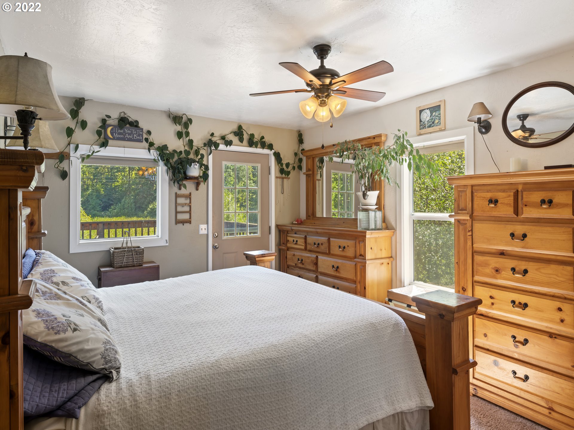 3530 Highway 38 Drain, OR 97435 - Photo 11 of 32 a bedroom with a large bed and a window