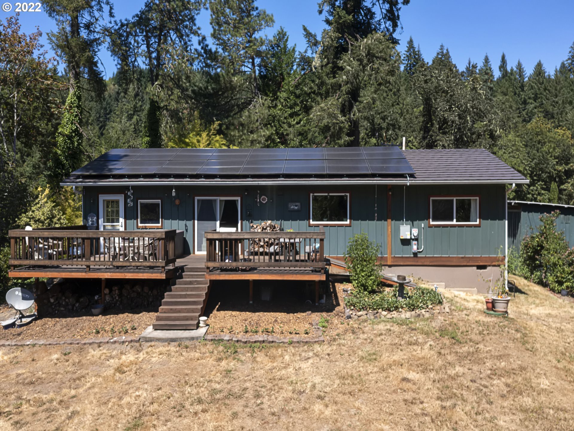 3530 Highway 38 Drain, OR 97435 - Photo 20 of 32 a front view of a house with porch and dining area