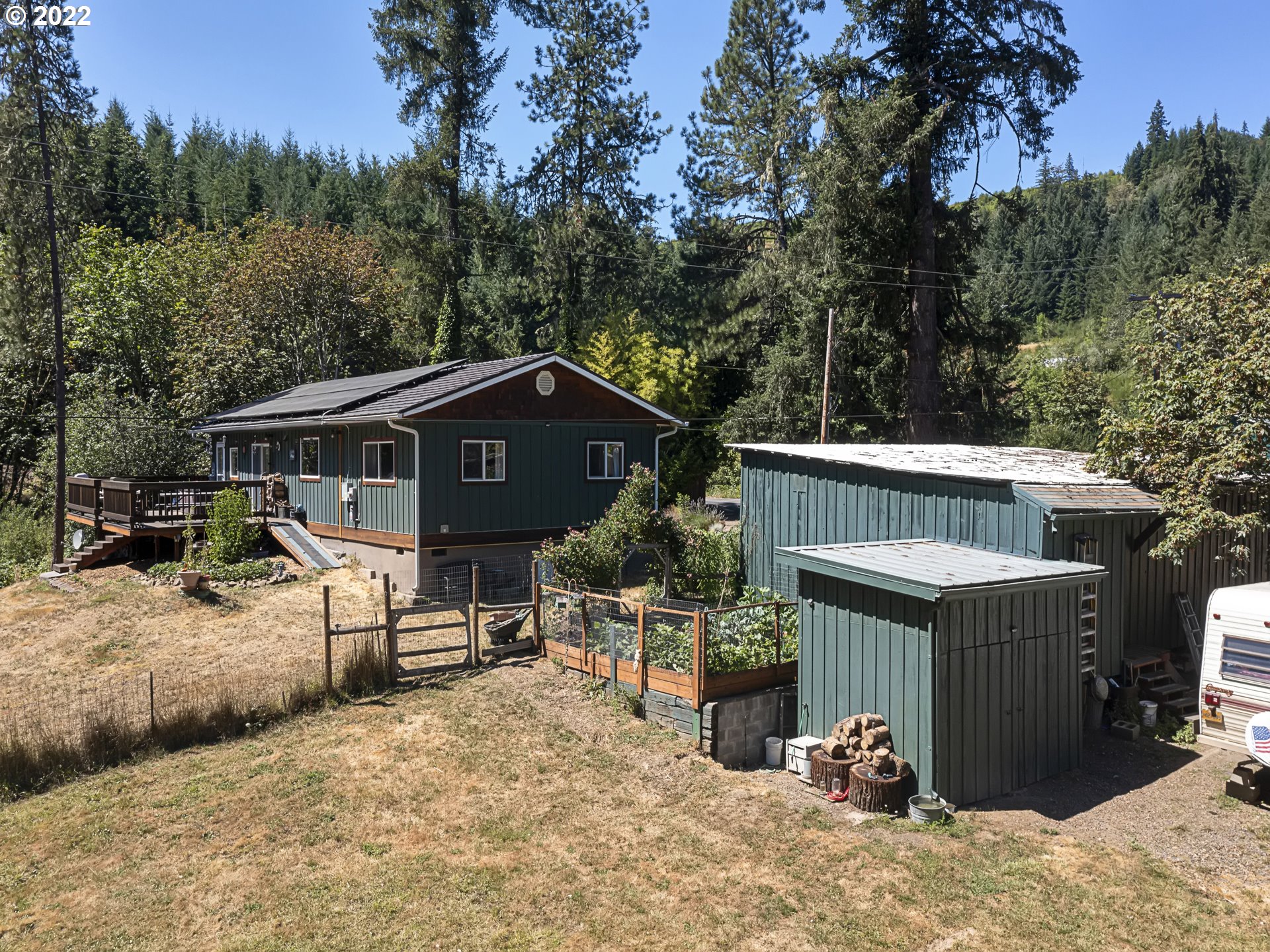 3530 Highway 38 Drain, OR 97435 - Photo 24 of 32 a view of a house with a yard and roof