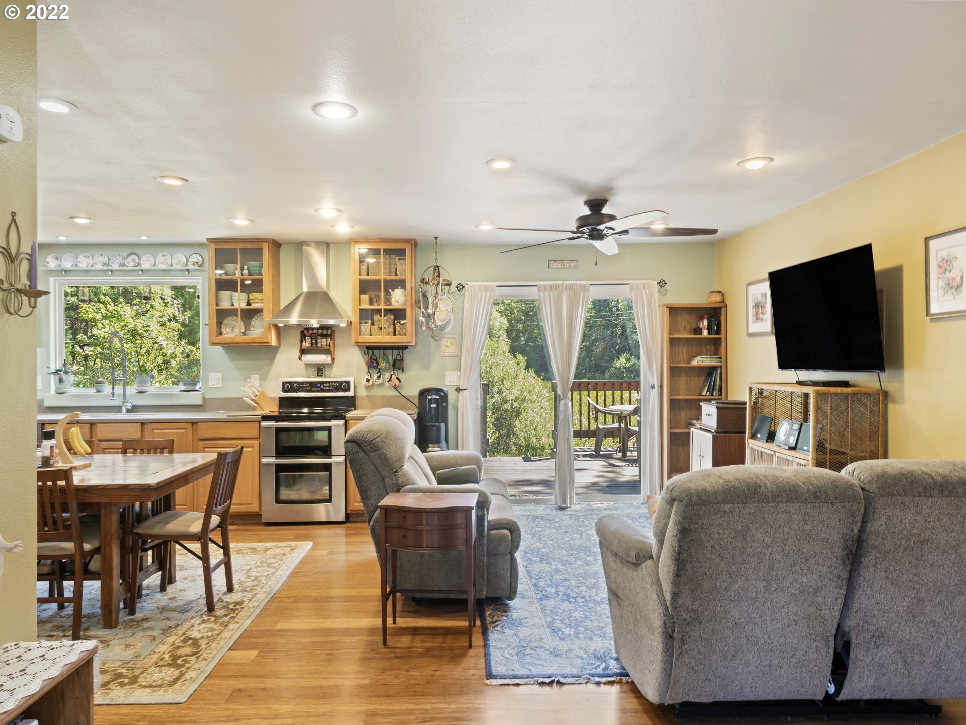 3530 Highway 38 Drain, OR 97435 - Photo 5 of 32 a living room with furniture and a flat screen tv