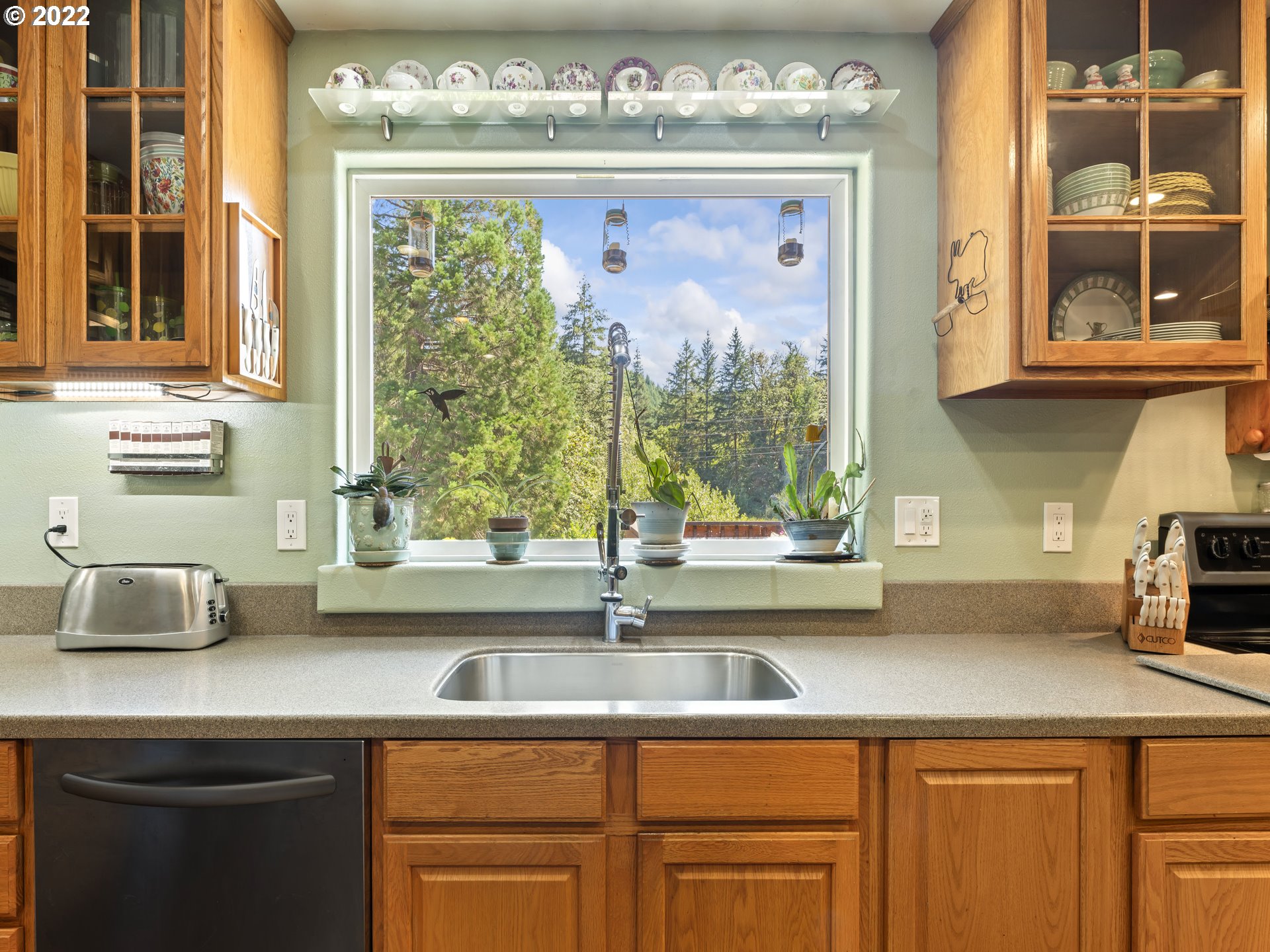3530 Highway 38 Drain, OR 97435 - Photo 10 of 32 a kitchen with a sink and large window