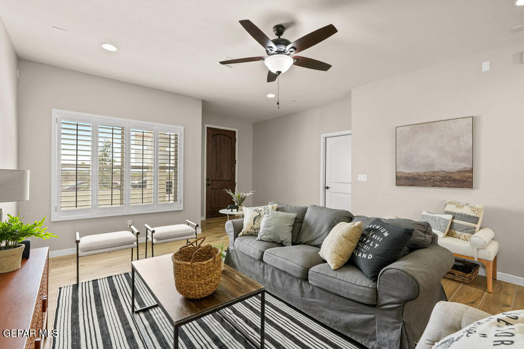 664 Paseo Musical Street El Paso, TX 79928 - Photo 11 of 50 a living room with furniture and a large window