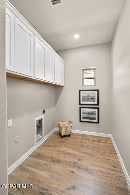 664 Paseo Musical Street El Paso, TX 79928 - Photo 29 of 50 a bedroom with a bed and cabinets