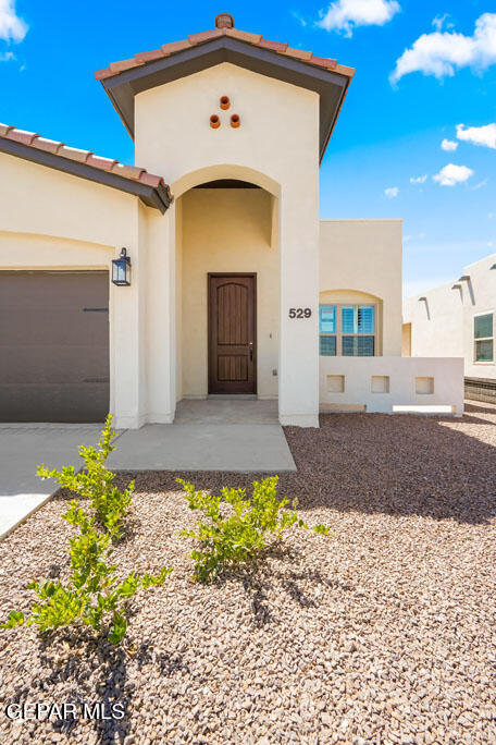 664 Paseo Musical Street El Paso, TX 79928 - Photo 5 of 50 a front view of a house with a yard