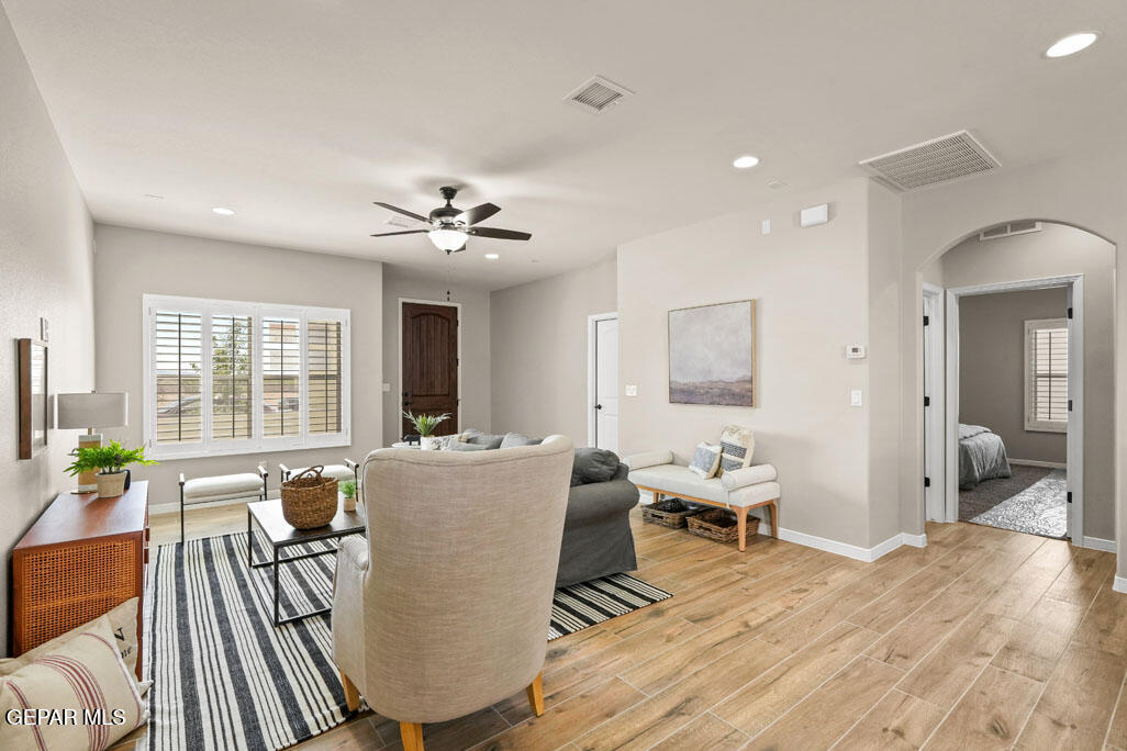 664 Paseo Musical Street El Paso, TX 79928 - Photo 10 of 50 a living room with furniture and a large window