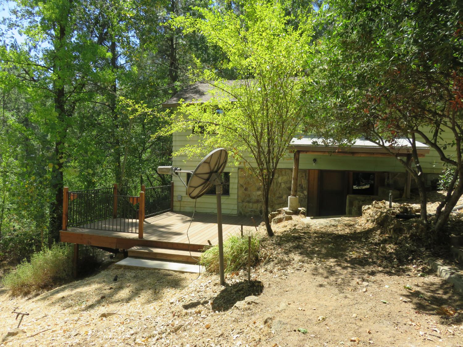 2563 Woodhouse Mine Road West Point, CA 95255 - Photo 11 of 49 a view of a house with a yard