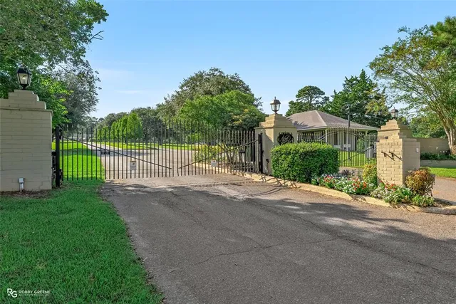 a view of a backyard with a garden